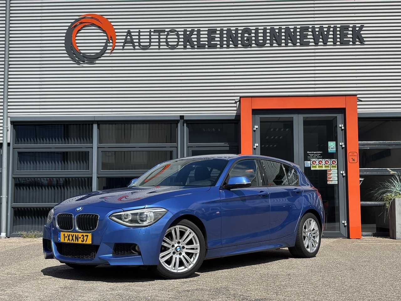 BMW 1-serie - 116i High Executive / Navigatie / M Pakket / Stoelverwarming / M Stuur & Stoelen / Winters - AutoWereld.nl