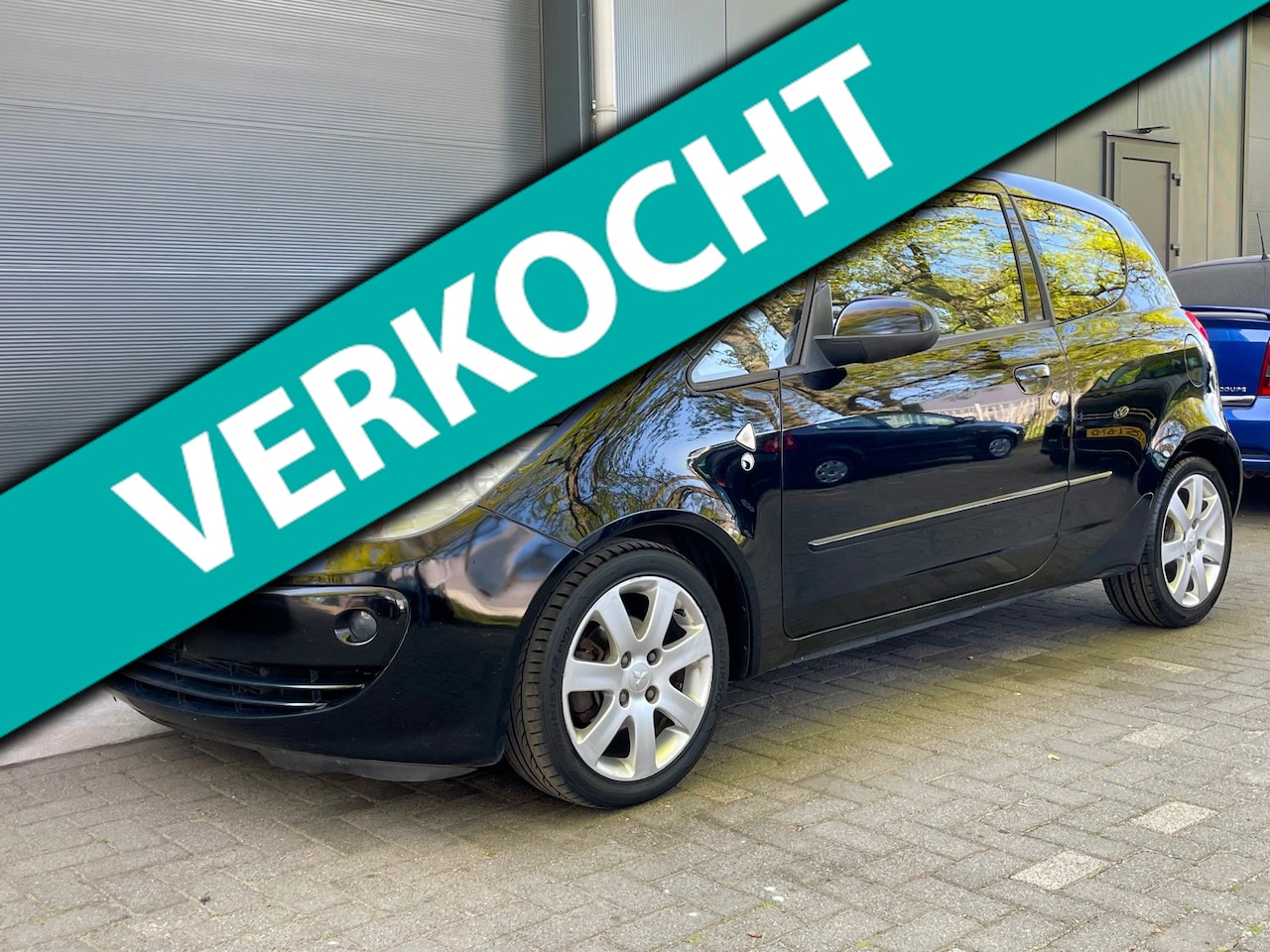 Mitsubishi Colt - 1.3 Instyle SPORT 95PK NAP AIRCO LEER LM VELGEN STOELVERWARMING CENTRALE VERGRENDELING - AutoWereld.nl