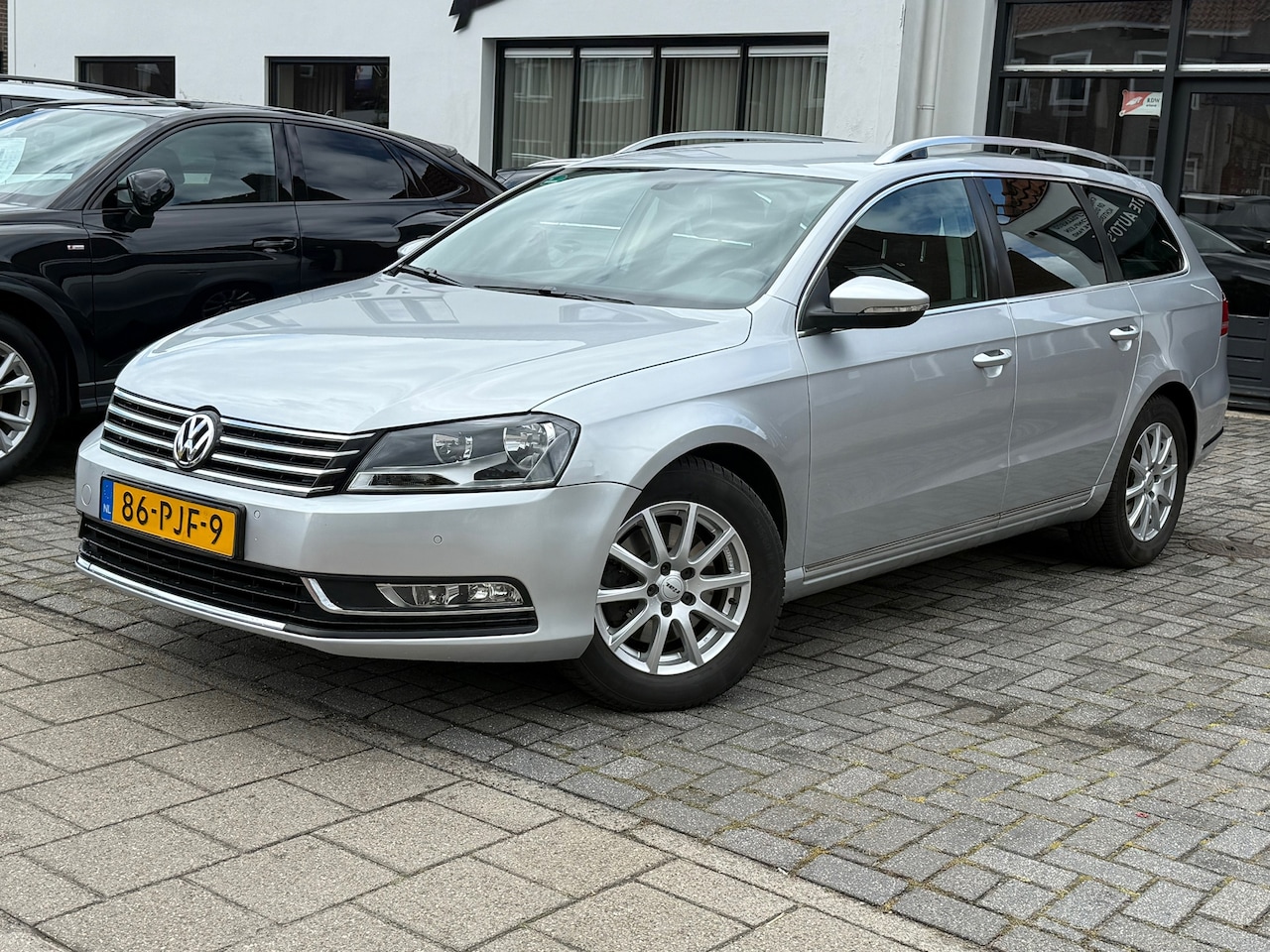 Volkswagen Passat Variant - 1.4 TSI Comfortline BlueMotion 1.4 TSI Comfortline BlueMotion, Navigatie,Parkeersensoren,Cruise control,Climate control - AutoWereld.nl