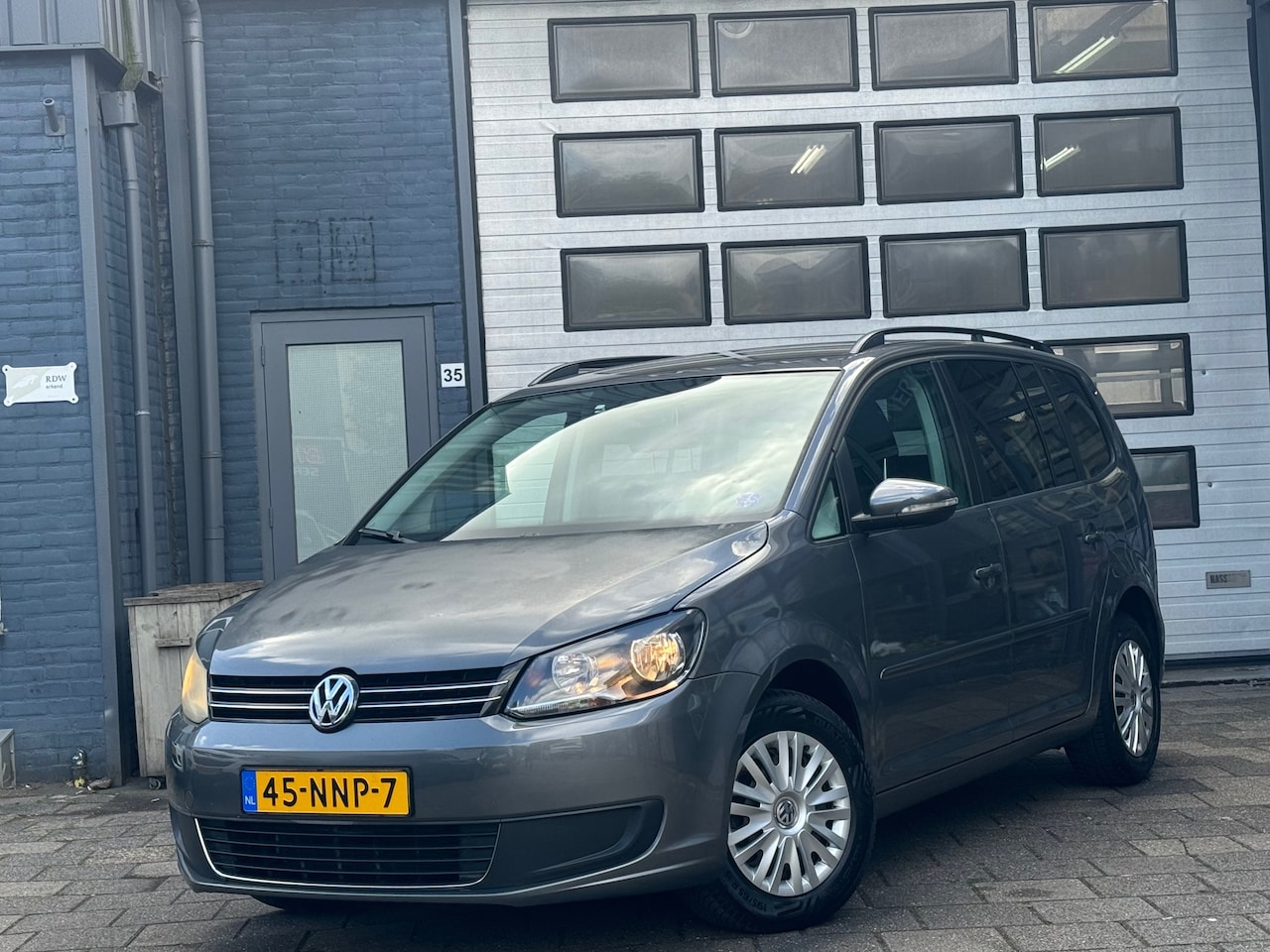 Volkswagen Touran - 1.2 TSI Comfortline BlueMotion | Clima | Navi | Cruise | N.A.P - AutoWereld.nl