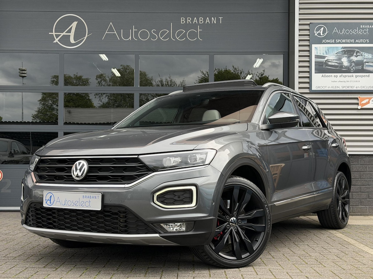 Volkswagen T-Roc - 2.0 TSI 4Motion Sport Pano | Leder | Dealer onderhouden - AutoWereld.nl
