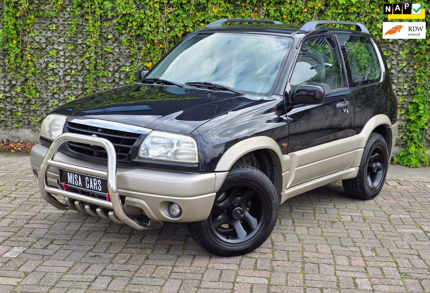 Suzuki Grand Vitara - 2.0 Metal Top Wide Body Airco 4x4 Sport velgen APK Tweede Eigenaar - AutoWereld.nl