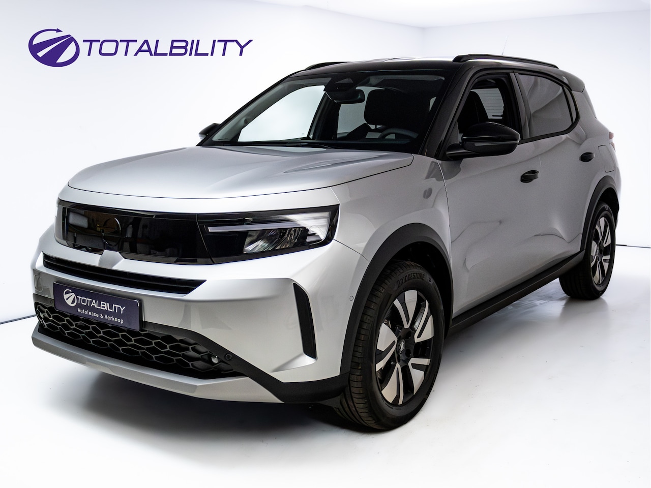 Opel Frontera - 1.2 Turbo Hybrid GS 7 persoons | Stoel-, Stuur- & voorruitverwarming | Camera | Apple Carp - AutoWereld.nl
