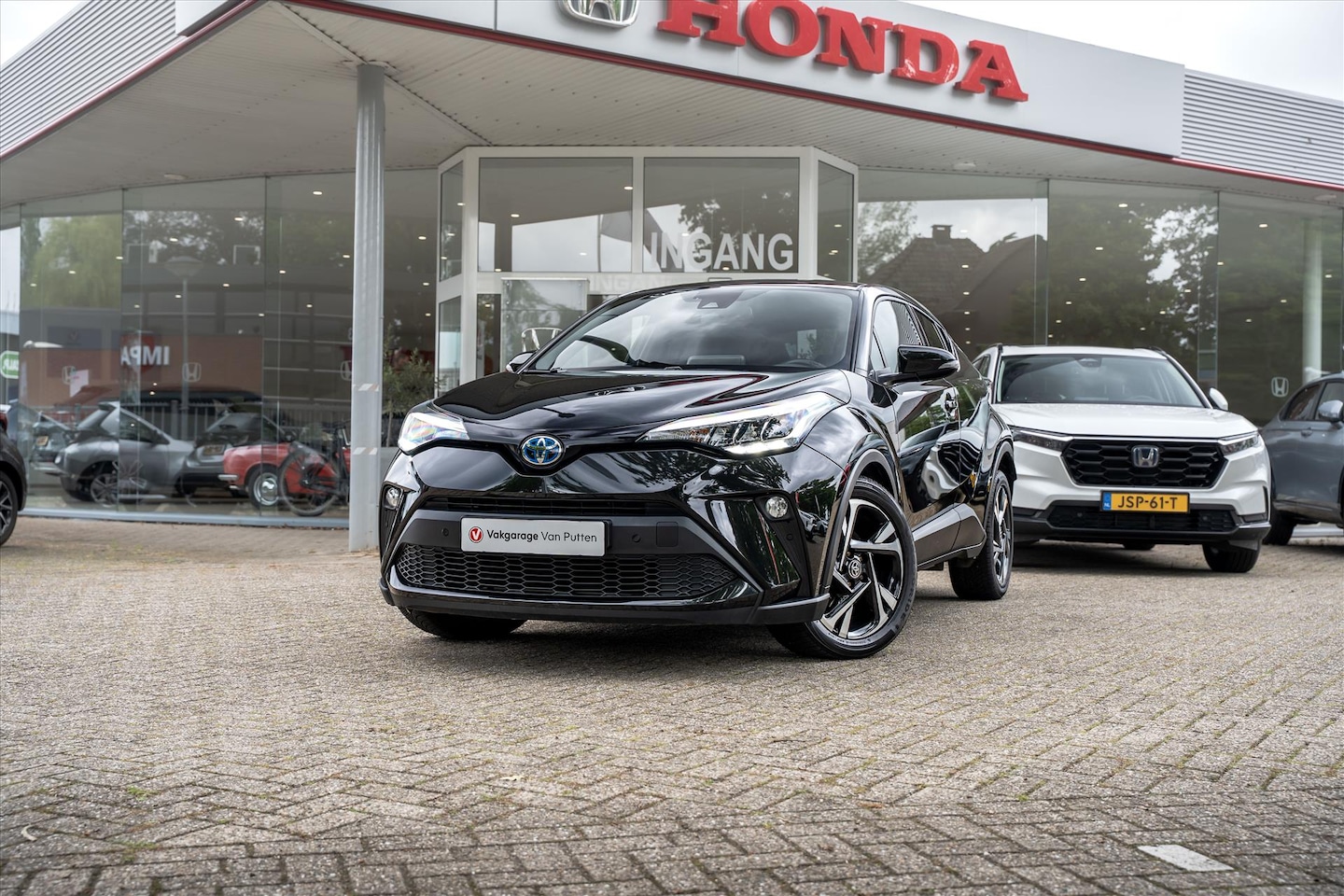 Toyota C-HR - 1.8 Hybrid Advance Automaat | 10 jaar garantie | Carplay | Adaptieve cruisecontrol | Dodeh - AutoWereld.nl