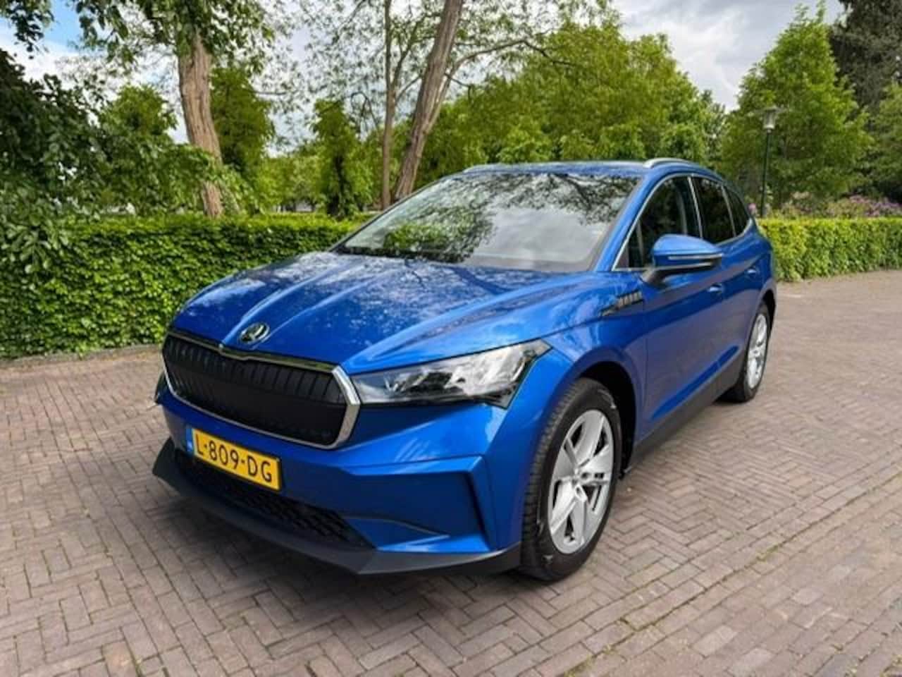 Skoda Enyaq iV - 80 77kWh 204pk SOH 91,6%/Warmtepomp/Trekhaak/Hleer/Acruise/Camera/Acarplay/Garantie - AutoWereld.nl