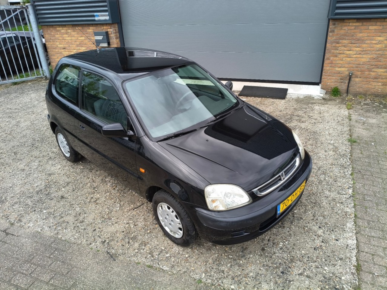 Honda Logo - 1.3 - AutoWereld.nl