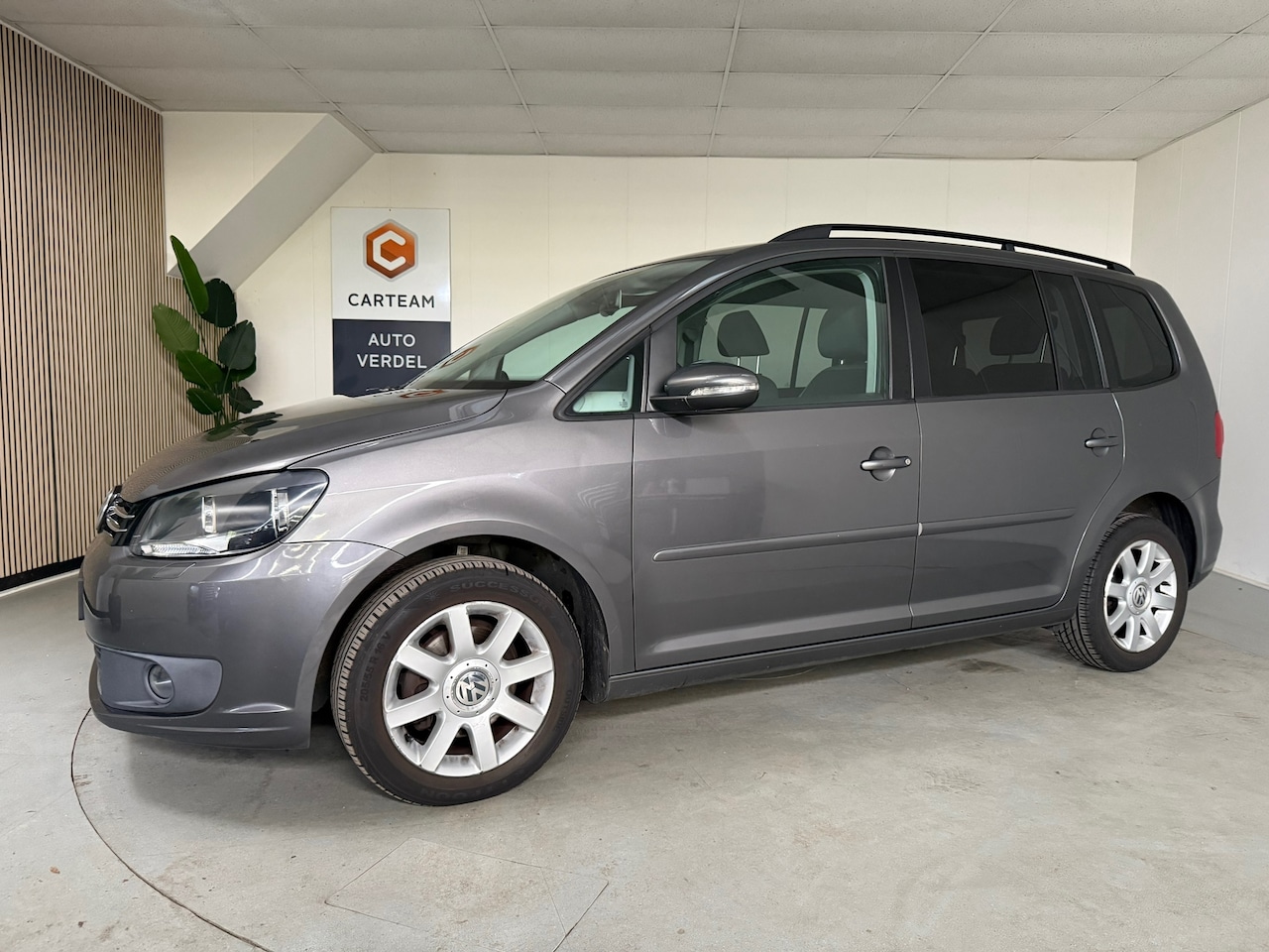Volkswagen Touran - 1.2 TSI Easyline Airco, Navigatie, LMV - AutoWereld.nl