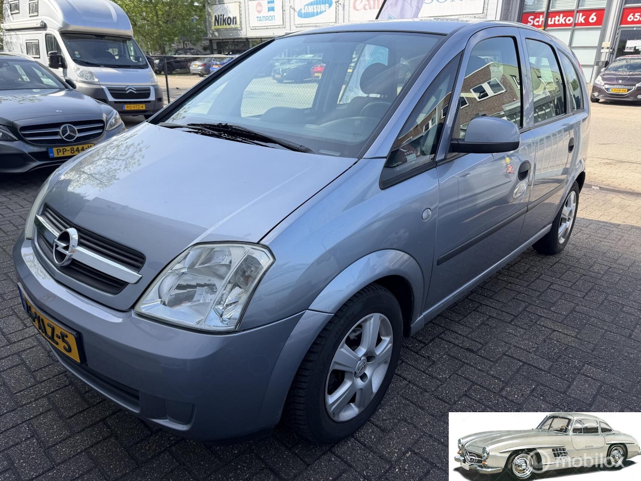 Opel Meriva - 1.4-16V Cosmo weinig km,s - AutoWereld.nl