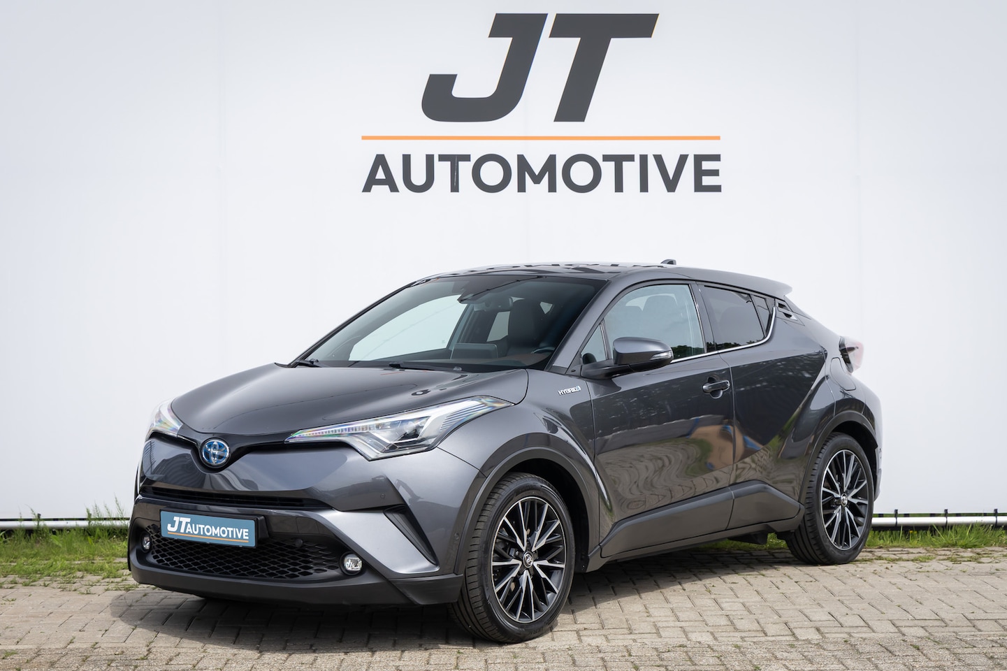 Toyota C-HR - 1.8 Hybrid Premium nlauto Stoelverwarming | Camera | PDC | half ledere bekleding | Stuurve - AutoWereld.nl
