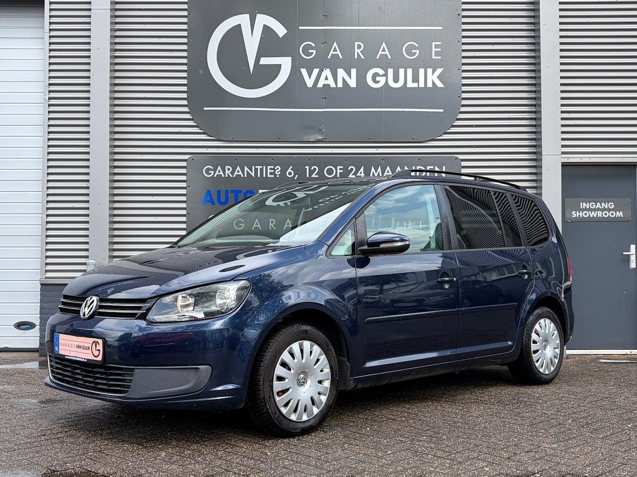 Volkswagen Touran - 1.2 TSI Comfortline BlueMotion 105PK 7Persoons,Trekhaak,Navi,Clima,Cruise,Isofix,Bluetooth - AutoWereld.nl