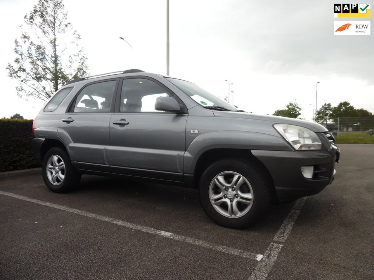 Kia Sportage - 2.0 CVVT Executive 2.0 CVVT Executive - AutoWereld.nl
