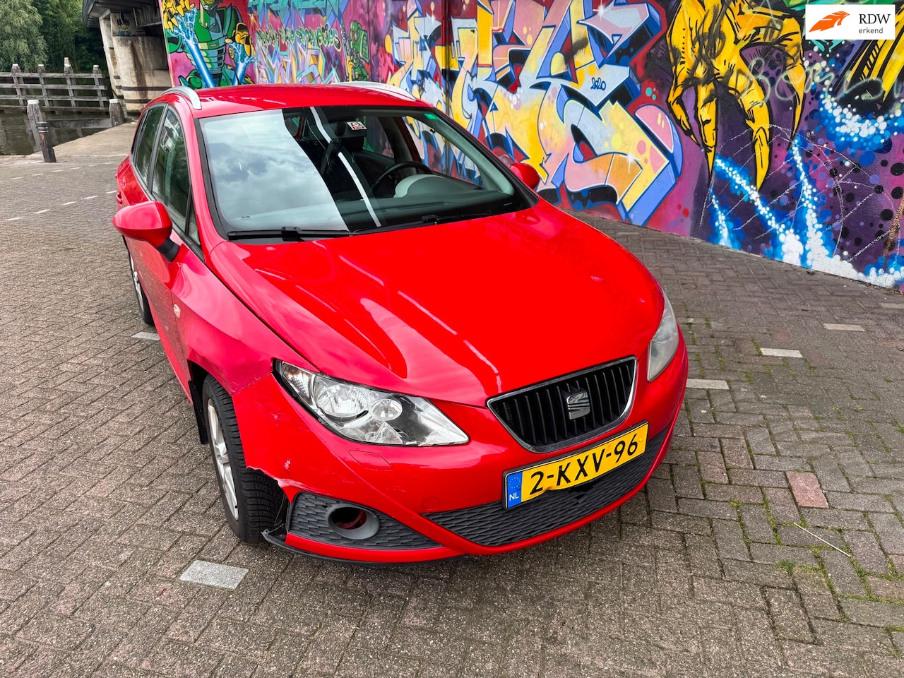 SEAT Ibiza ST - 1.2 TSI Sport benzine airco verwarmde stoelen 197d km boeken aanwezig. lichte schade rijd - AutoWereld.nl