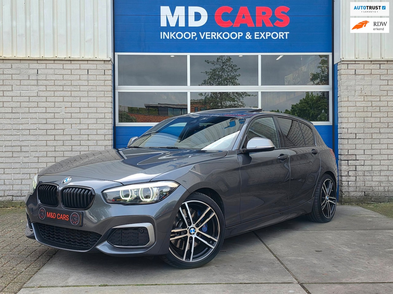 BMW 1-serie - M140i xDrive High Executive SCHUIFDAK/MEMORY STOELEN/HARMAN KARDON - AutoWereld.nl
