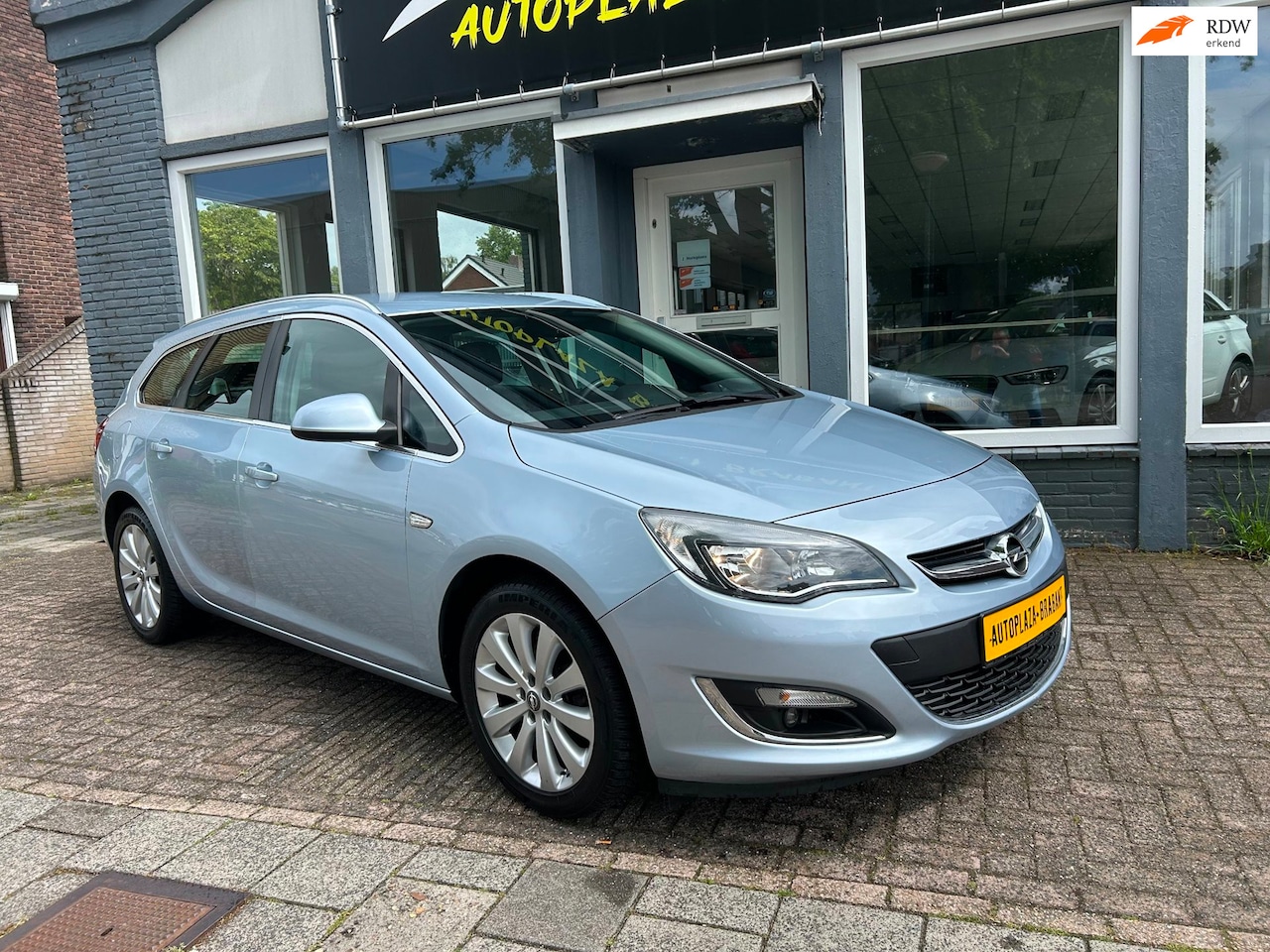 Opel Astra Sports Tourer - 1.4 Turbo Edition / NAVI / ACHTERUITRIJ CAMERA / PDC - AutoWereld.nl