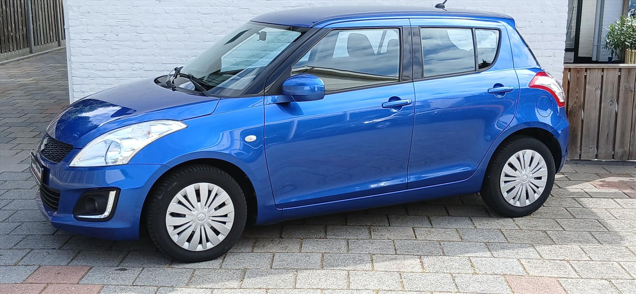 Suzuki Swift - 1.2 5drs vvt comfort airco/cruise 68000 km - AutoWereld.nl