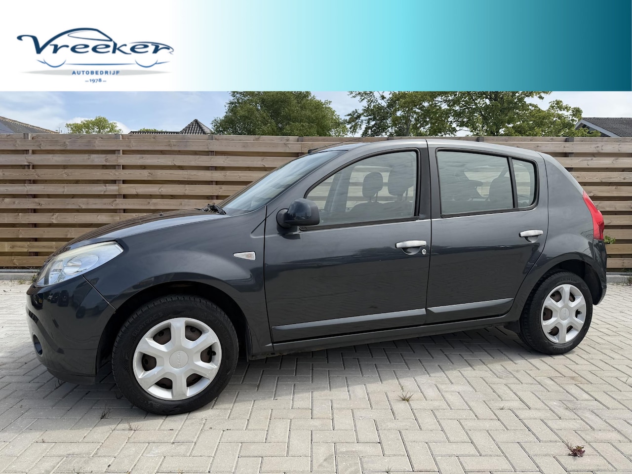 Dacia Sandero - 1.2 Lauréate Airco l nieuwe apk - AutoWereld.nl