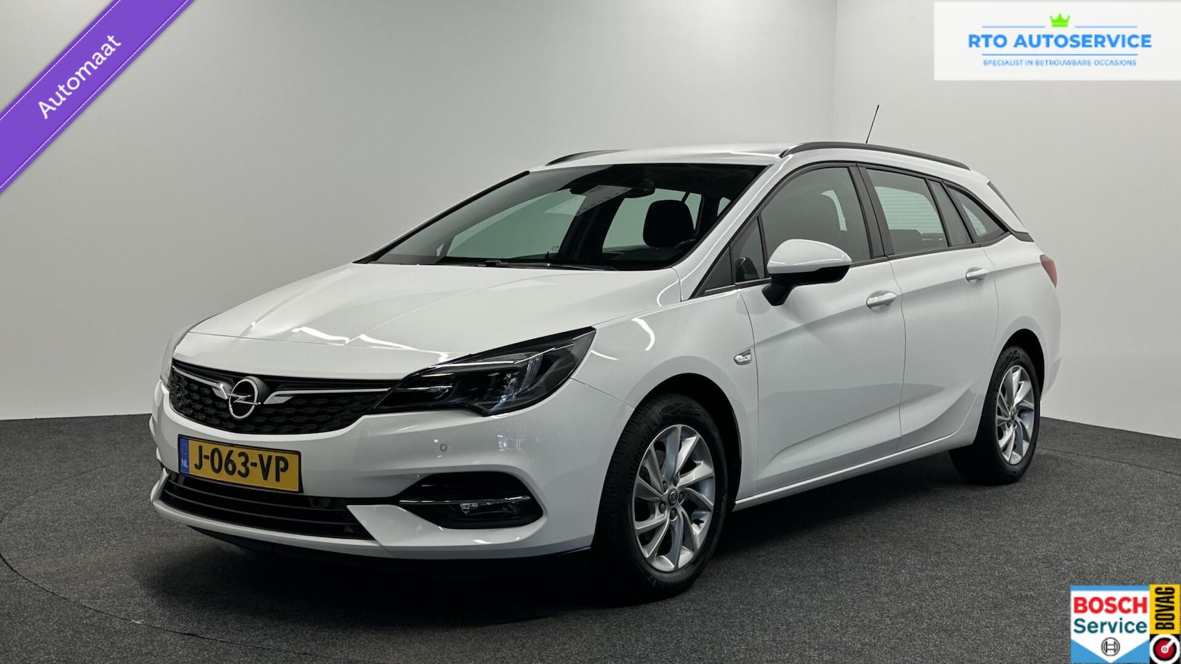 Opel Astra Sports Tourer - 1.4 Edition AUTOMAAT NAVIGATIE 63000 KM - AutoWereld.nl