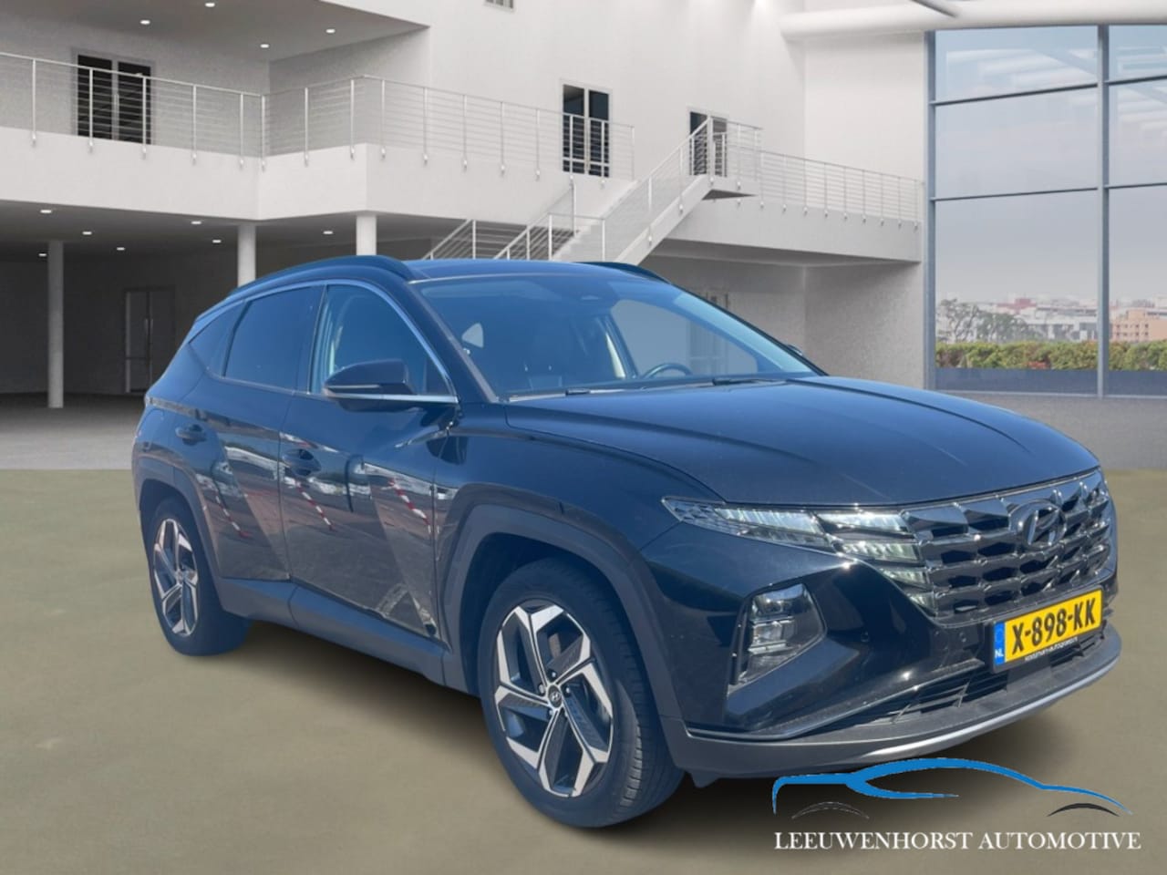 Hyundai Tucson - 1.6 T-GDI PHEV Premium Sky 4WD 1.6 T-GDI PHEV Premium Sky 4WD, full option, nw. model, duurste uitvoering, dealerauto - AutoWereld.nl