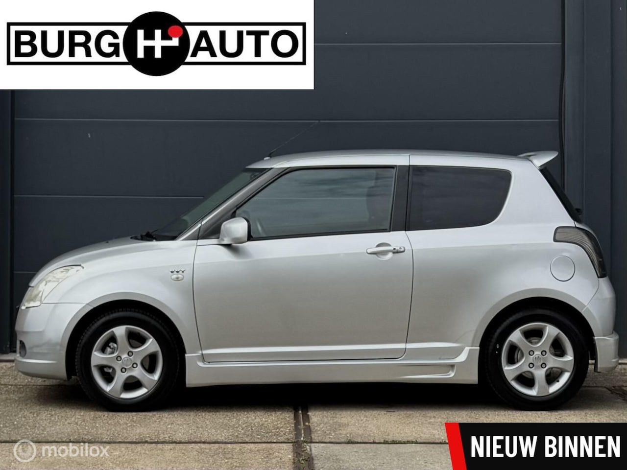 Suzuki Swift - 1.5 Exclusive - APK TM 11-03-2027 - KEYLESS - LMV - EL. RAMEN + SPIEGELS - ACHTERSPOILER - - AutoWereld.nl