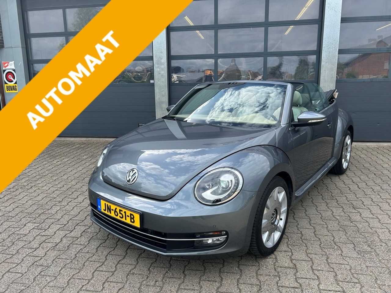 Volkswagen Beetle Cabriolet - 1.2 TSI 105pk DSG Design - AutoWereld.nl