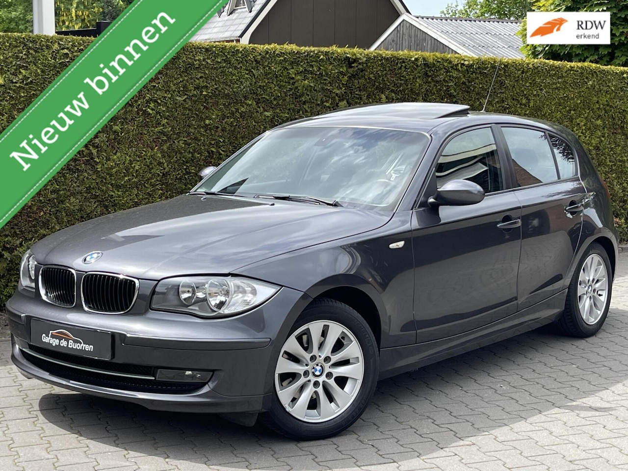 BMW 1-serie - 118d Corporate Executive | OPEN SCHUIF/KANTELDAK | TREKHAAK | CRUISE CONTROL | AIRCONDITIO - AutoWereld.nl