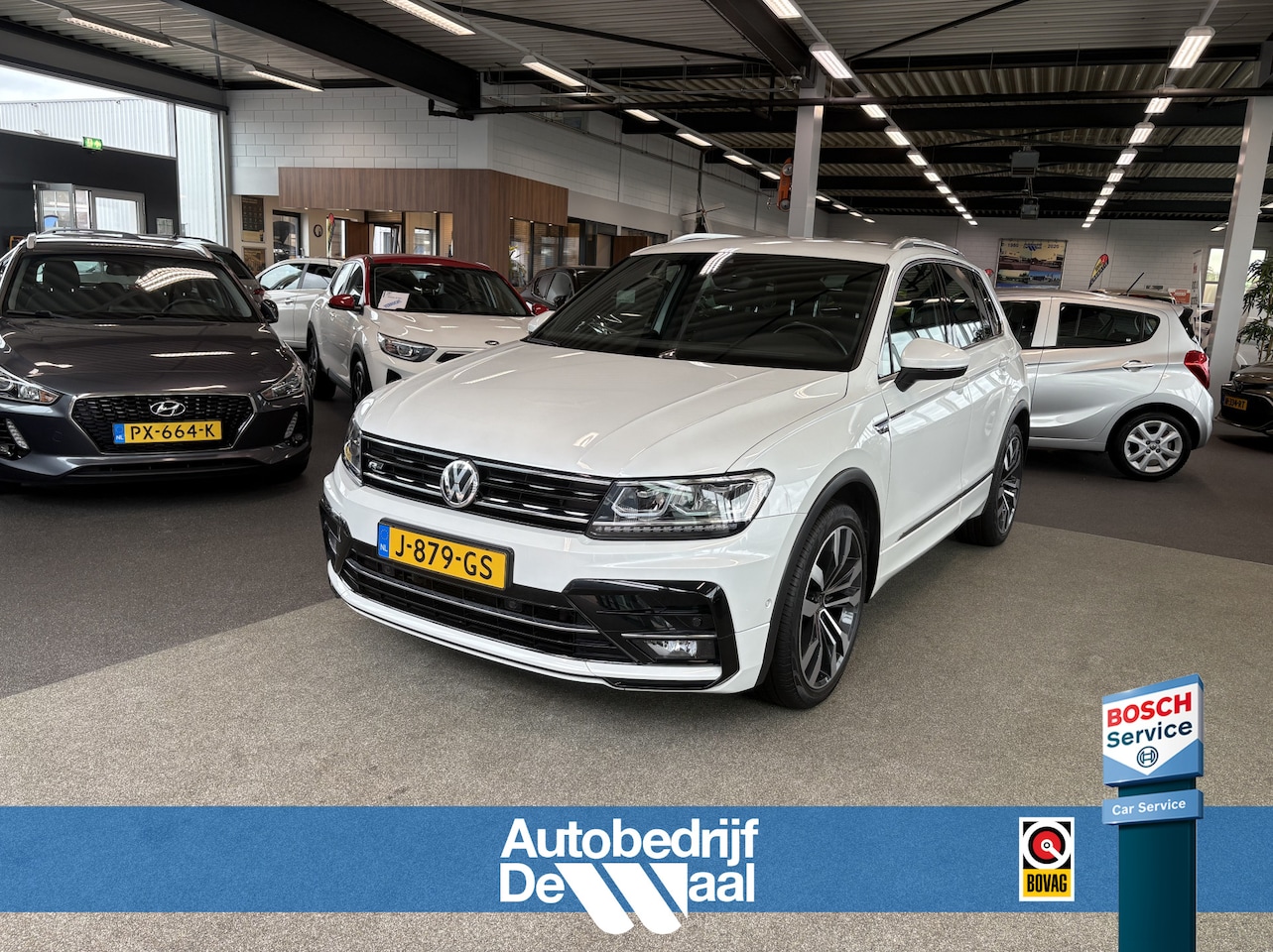 Volkswagen Tiguan - 1.5 TSi 150pk DSG Highline Business R-Line CAMERA/VIRTUAL/20INCH/ORYX WHITE PEARL - AutoWereld.nl