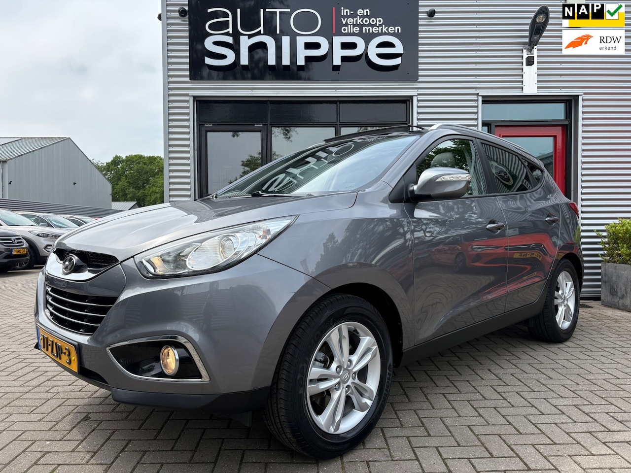 Hyundai ix35 - 2.0i Business Edition -AUTOMAAT-CLIMA-CRUISE-OPEN DAK-TREKHAAK-1600 KG TREKGEWICHT-ORIGINE - AutoWereld.nl