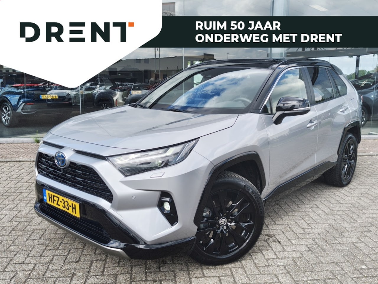 Toyota RAV4 - 2.5 Hybrid Style Bi-Tone | Schuifkanteldak | Leder/Alcantara | J - AutoWereld.nl