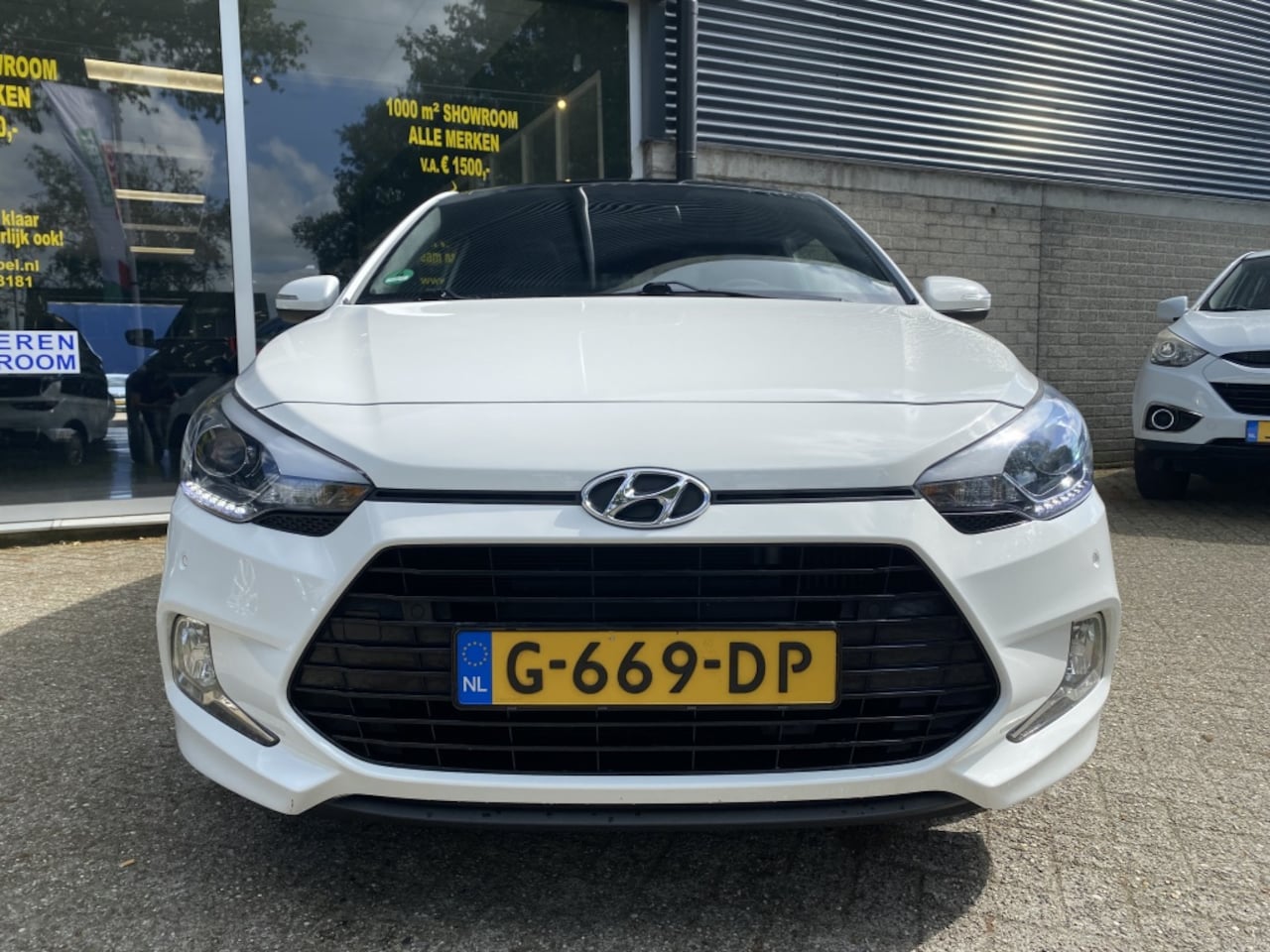 Hyundai i20 Coupé - Uniek !!!1.0 T-GDI Premium 120PK Pano/Clima/Nav/Cam - AutoWereld.nl