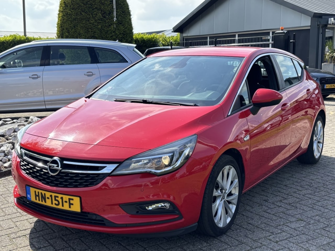 Opel Astra - 1.4 Turbo 5-Deurs Rood 2015 Nieuw Model - AutoWereld.nl