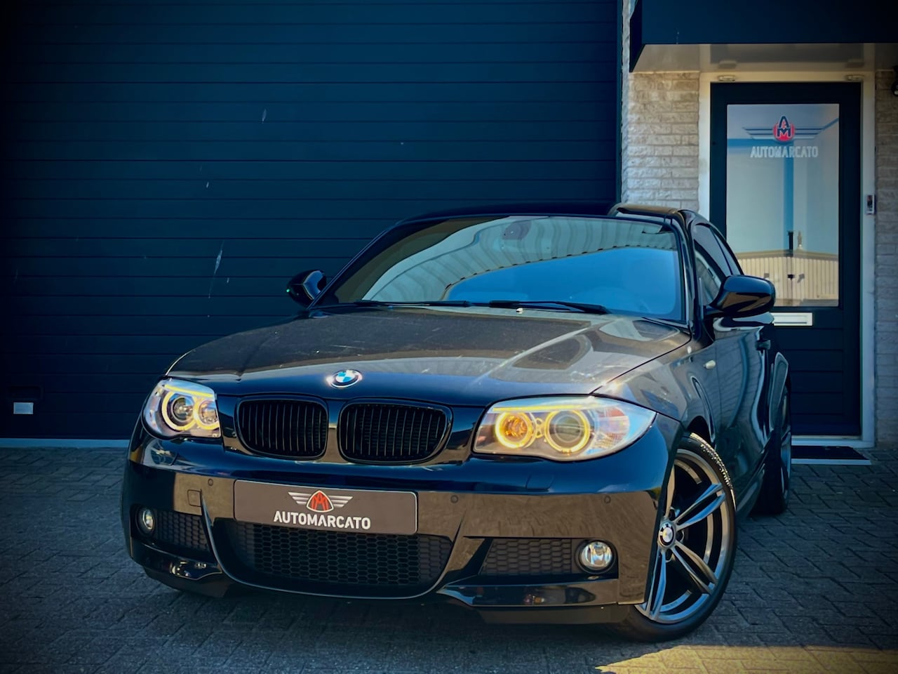 BMW 1-serie Coupé - 120i High Executive | M-Sportpakket | Navi Proff. | Leder | Xenon | Cruise | 18 Inch Sport - AutoWereld.nl