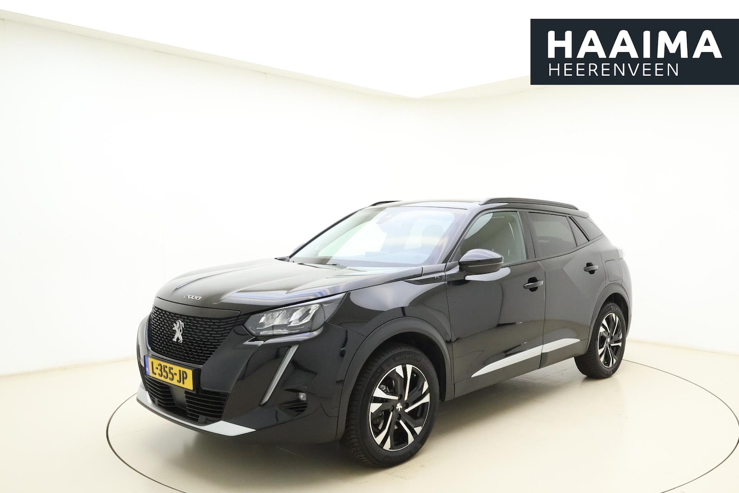 Peugeot e-2008 - EV Allure Pack 50 kWh | Navigatie | Apple Carplay | Stoelverw. | Camera | Climate & Cruise - AutoWereld.nl