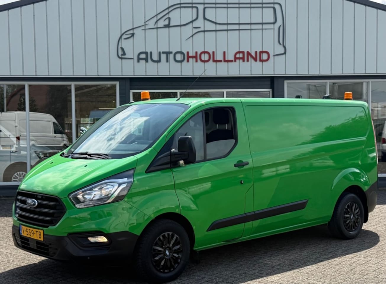 Ford Transit Custom - 2.0 TDCI 77KW 105PK L2H1 EURO 6 AIRCO/ CRUISE CONTROL/ CAMERA/ 100% DEALERONDERHOUDEN - AutoWereld.nl