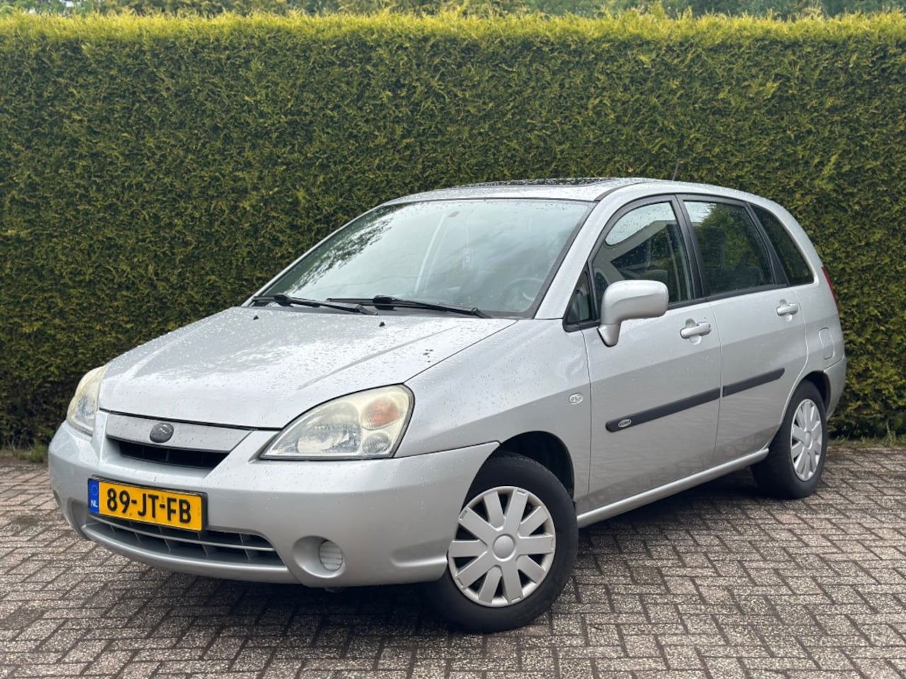 Suzuki Liana - 1.6 GLX 1.6 GLX Nieuwe APK - AutoWereld.nl