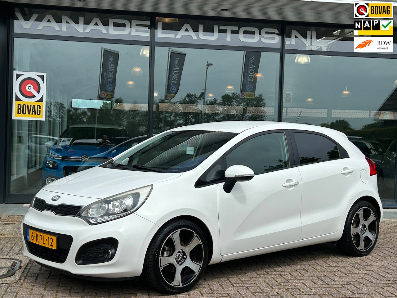 Kia Rio - 1.2 CVVT Super Pack 5Drs Navi Park.Sens Clima Cruise NL-Auto NAP Dealeronderhouden! - AutoWereld.nl