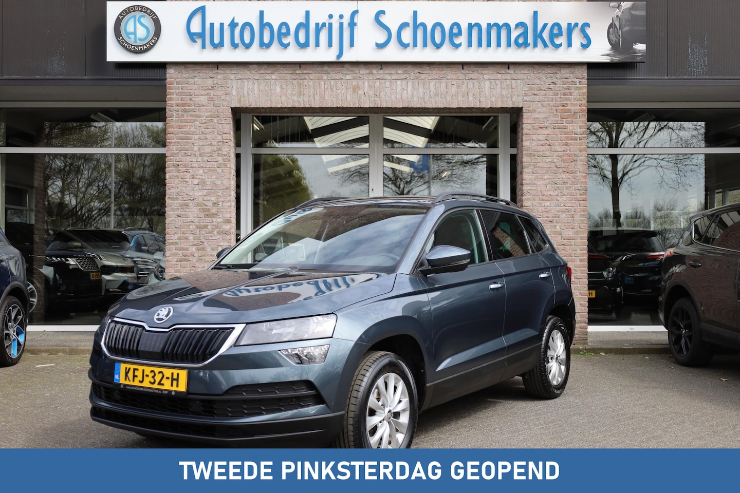 Skoda Karoq - 1.0 TSI Business Edition Plus TREKHAAK-ELEC. CAMERA STOELVERWARMING CARPLAY SFEERVERLICHTI - AutoWereld.nl
