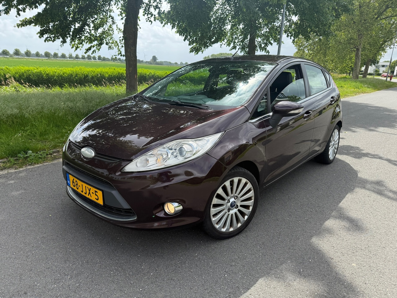 Ford Fiesta - 1.6 Titanium CLIMA/CRUISE/NAVI/LEER - AutoWereld.nl
