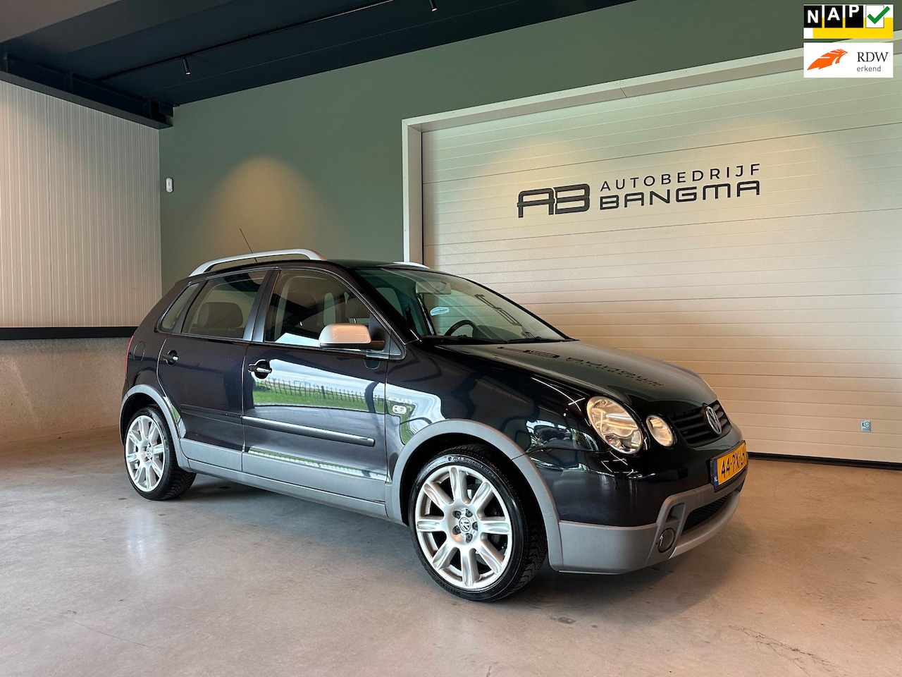 Volkswagen Polo - 1.4-16V CROSSPOLO FUN-uitv|AIRCO|VELGEN|ISOFIX|NAVIGATIE|BLUETOOTH+AUX+USB+GOOGLE+SPOTIFY| - AutoWereld.nl