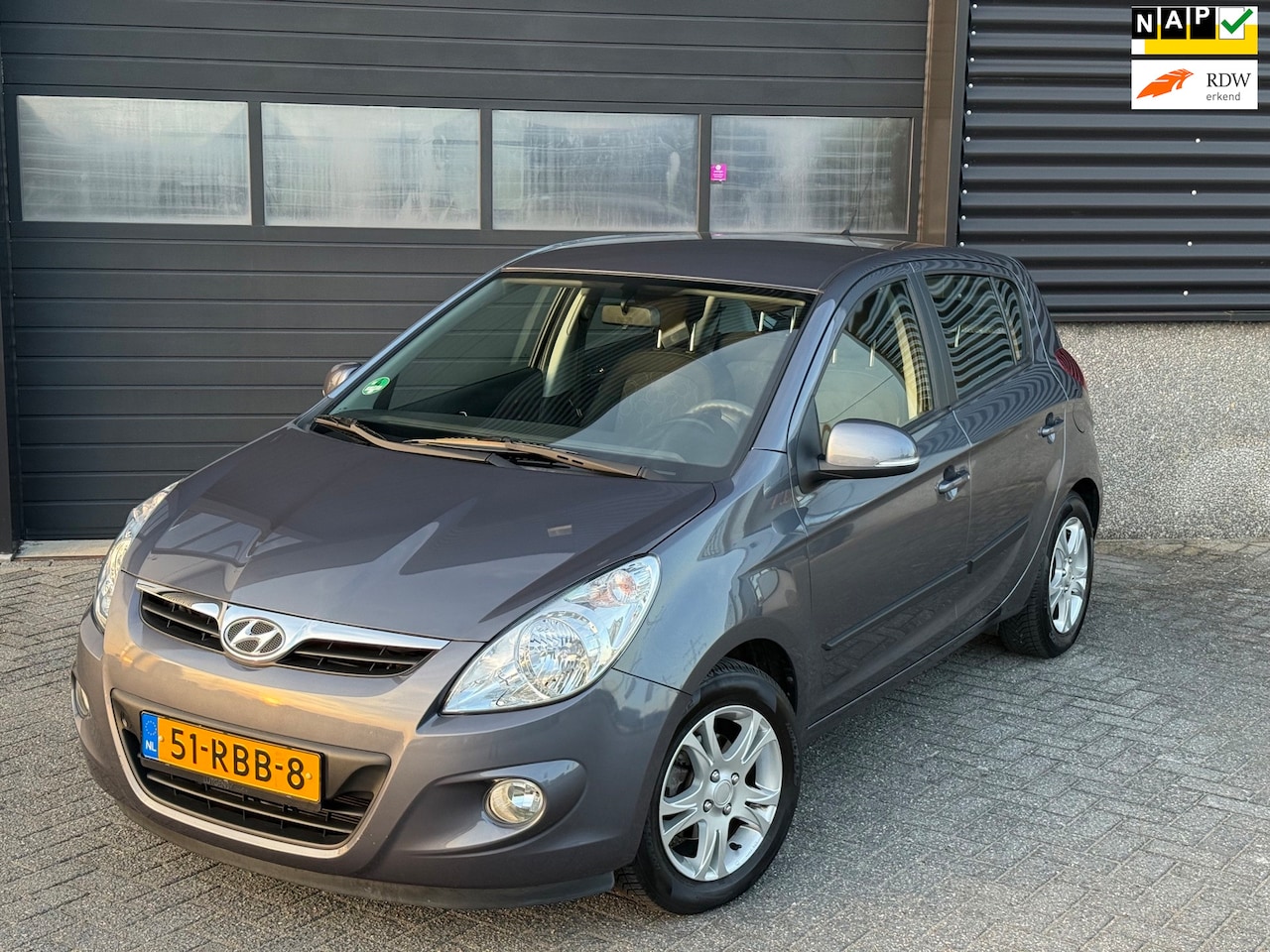 Hyundai i20 - 1.2i i-Motion Airco Navi - AutoWereld.nl