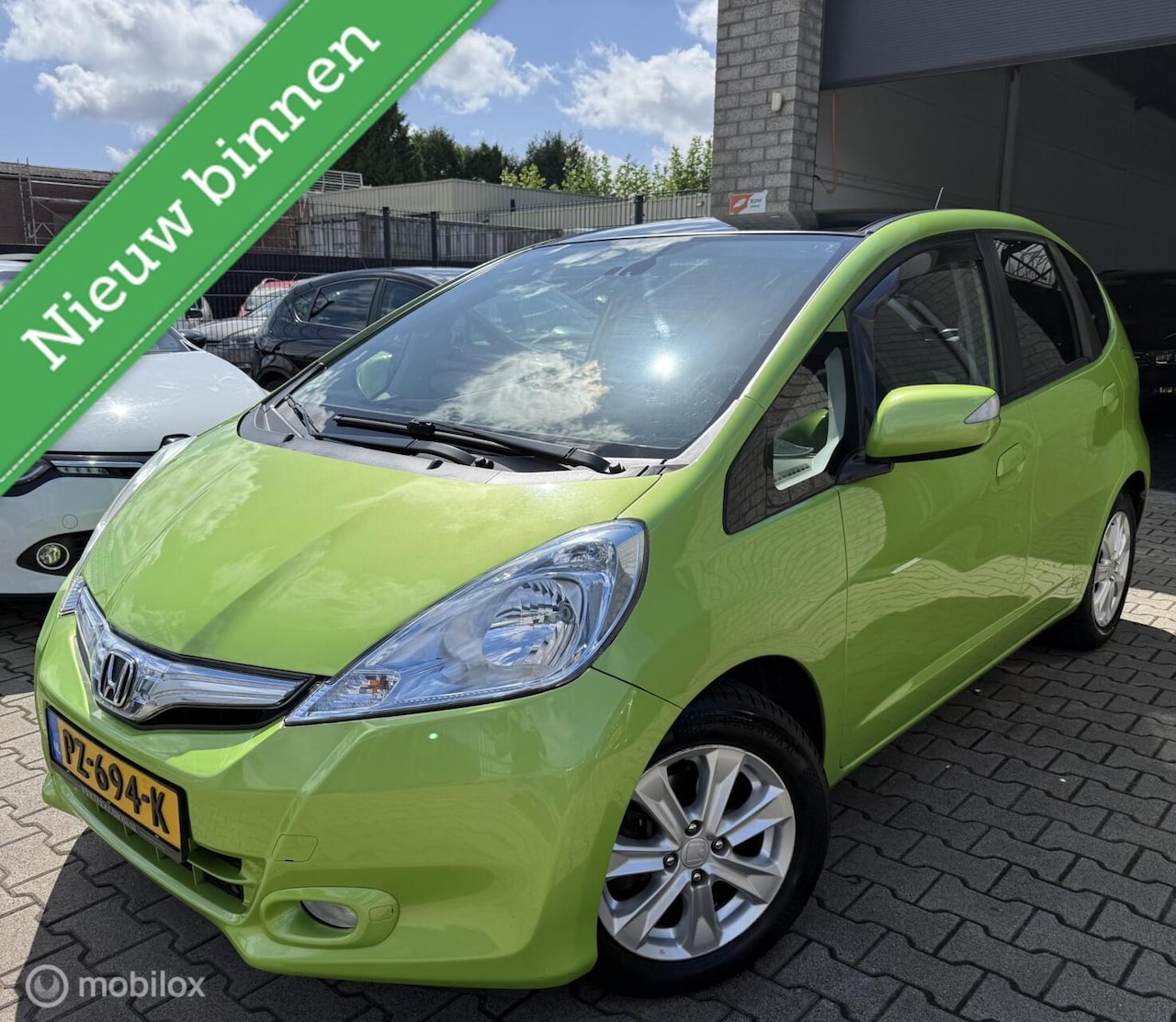 Honda Jazz - 1.4 Hybrid Elegance/Unieke Kleur /Automaat /N.A.P - AutoWereld.nl