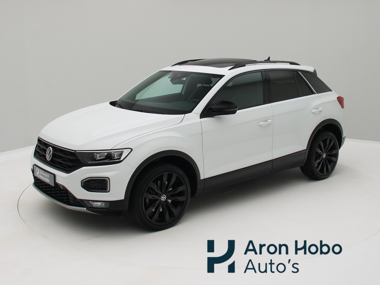 Volkswagen T-Roc - 1.5 TSI Sport Pano, Trekhaak, Camera, Stoelverwarming - AutoWereld.nl