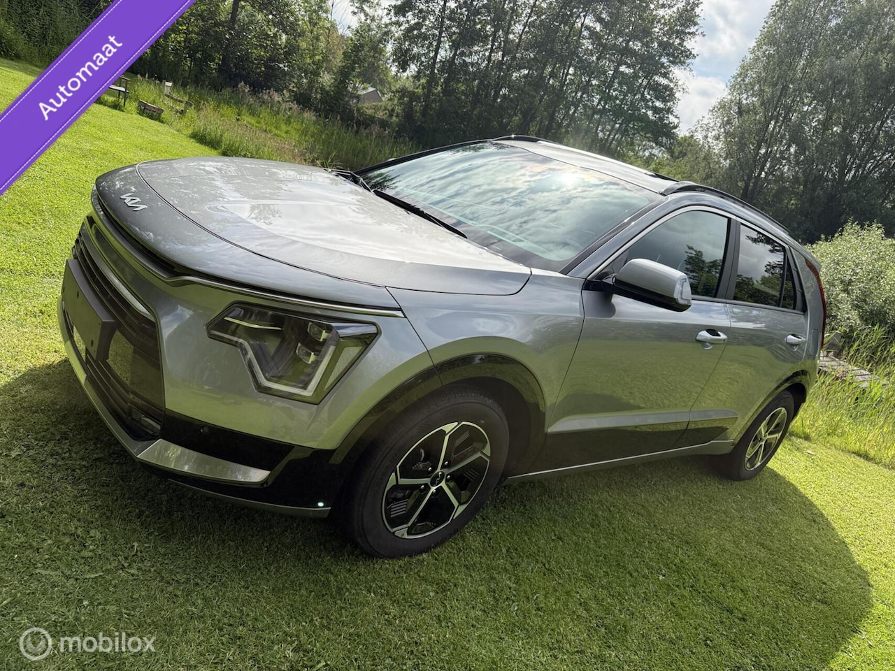 Kia Niro - Hybrid Premium 2025 Schuifdak € 20.750,- schade - AutoWereld.nl