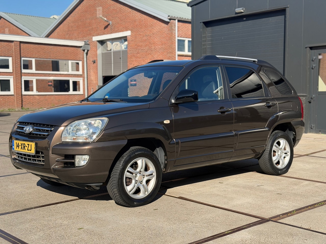 Kia Sportage - 2.0 CVVT X-ecutive Clima Cruise Leder Trekhaak - AutoWereld.nl