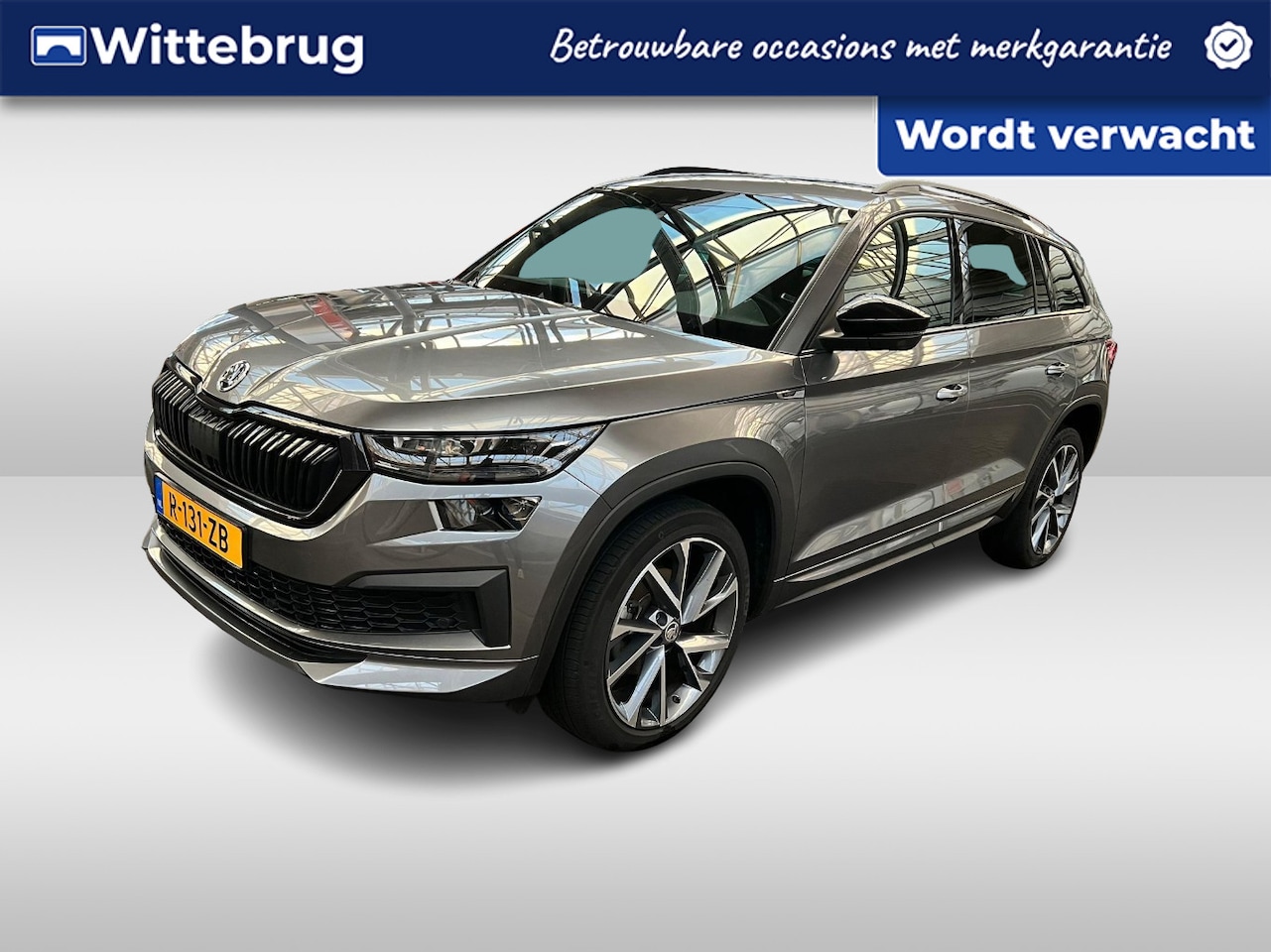 Skoda Kodiaq - 1.5 TSI Sportline Business / Pano / Navigatie / Camera / Parkeersensoren V+A / App connect - AutoWereld.nl
