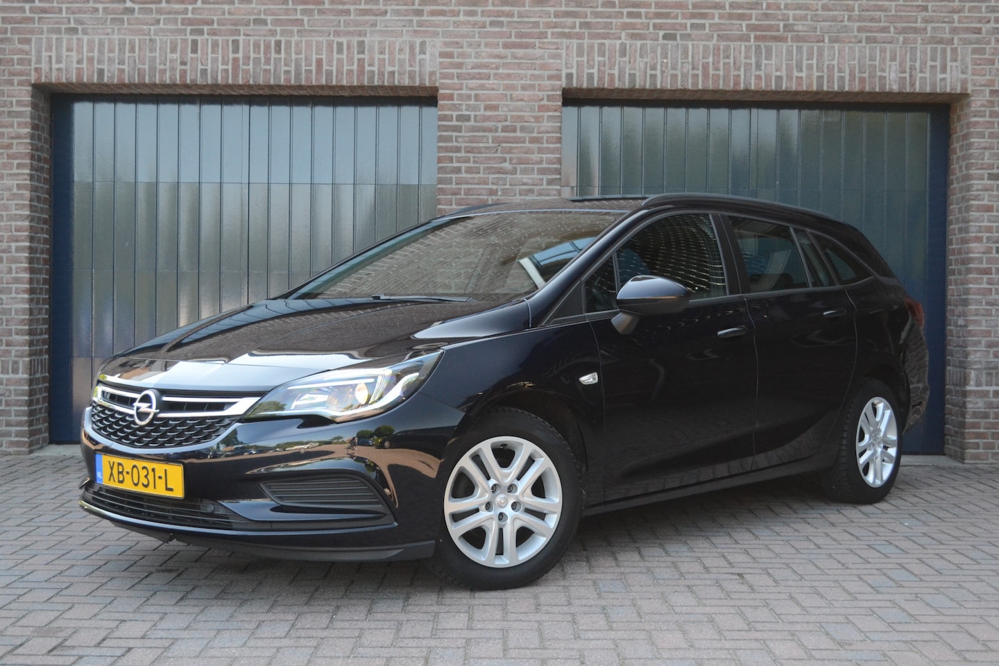 Opel Astra Sports Tourer - 1.0 Turbo Online Edition | Navigatie | Parkeersensoren | Airco | Cruise - AutoWereld.nl