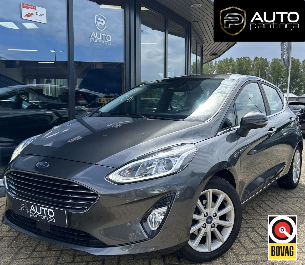 Ford Fiesta - 1.0 EcoBoost Titanium 101PK | 1e Eigenaar! | Dealeronderhouden | NL AUTO | AUTOMAAT | Trek - AutoWereld.nl