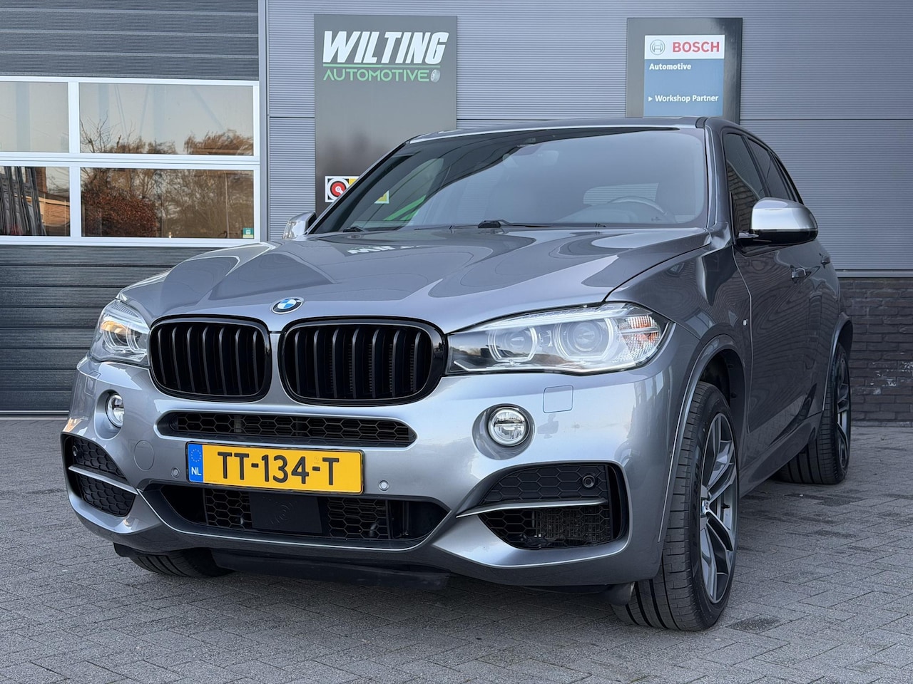 BMW X5 - M50d Trekhaak|Panoramadak|Bang&Olufsen|Luchtvereing achterkant - AutoWereld.nl