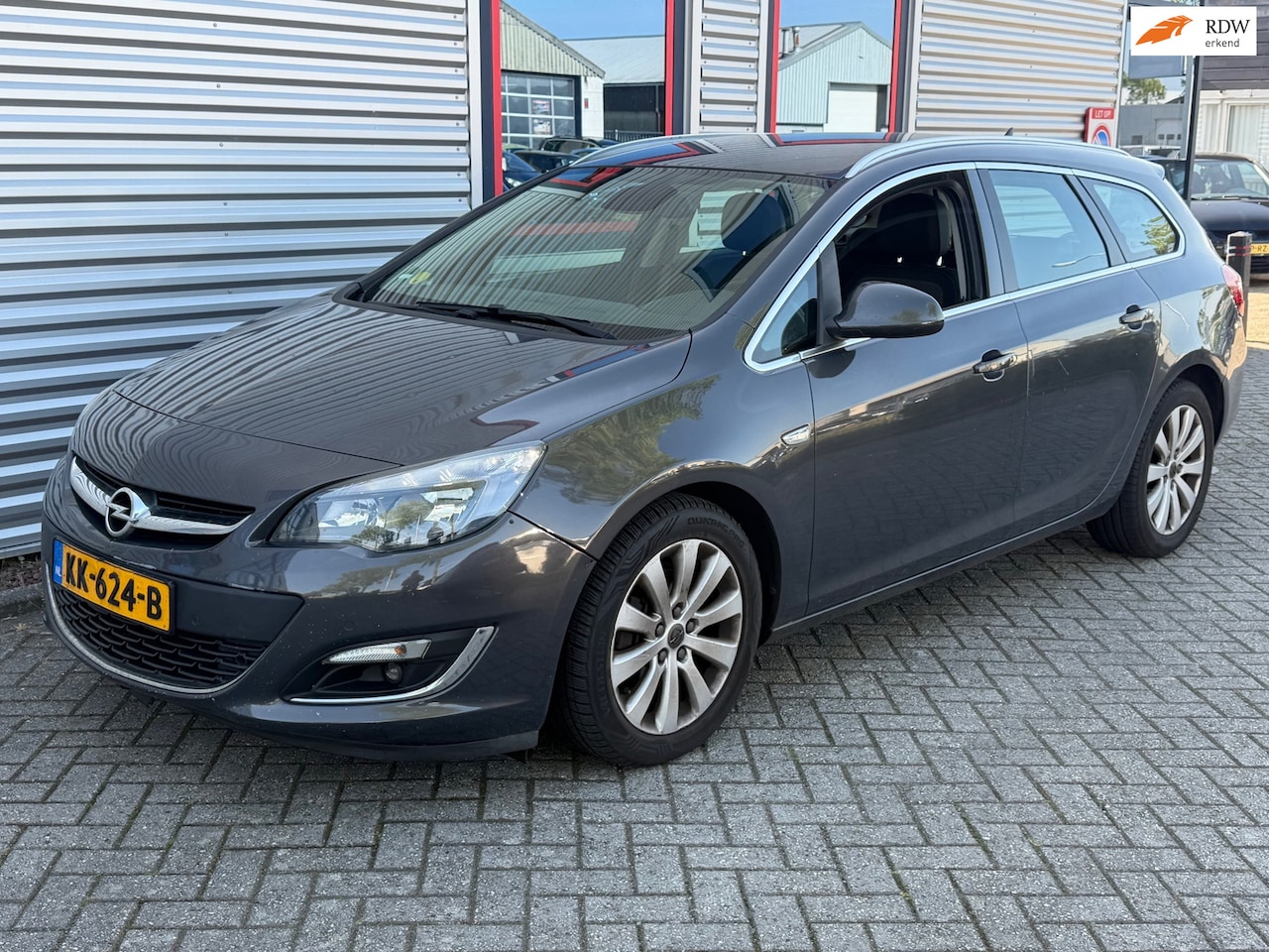 Opel Astra Sports Tourer - 1.7 CDTi Cosmo Leder - AutoWereld.nl