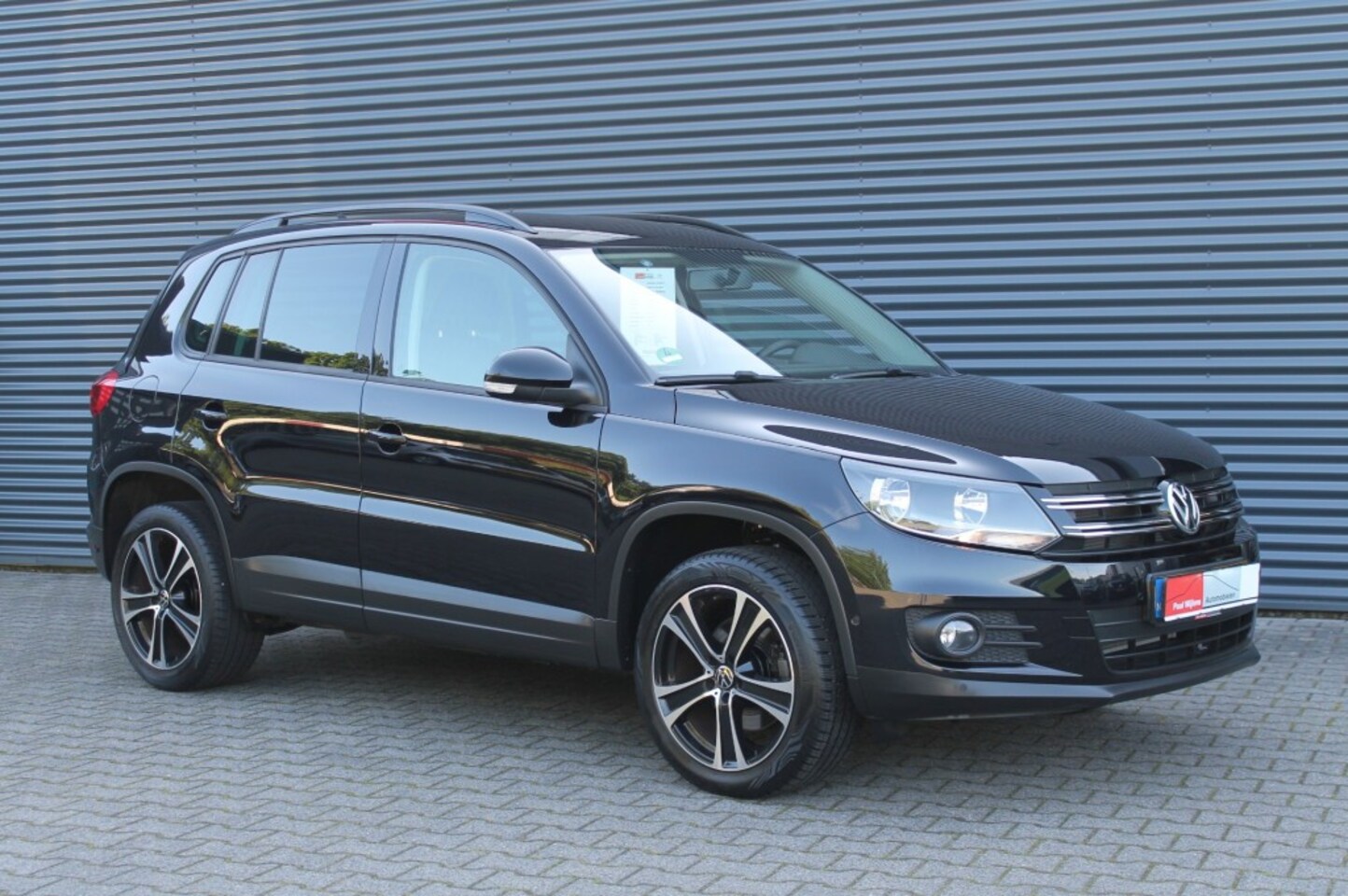 Volkswagen Tiguan - 1.4 TSi Bluemotion ComfortenDesign Uitv. NAVIGATIE - AutoWereld.nl