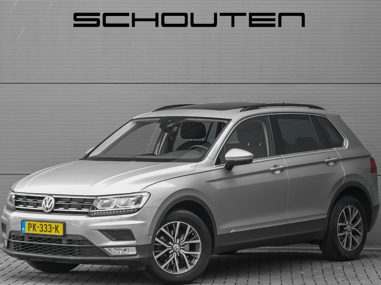 Volkswagen Tiguan - 1.4 TSI Highline Pano LED CarPlay Camera 17" - AutoWereld.nl